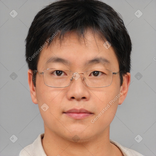 Neutral asian adult male with short  brown hair and brown eyes