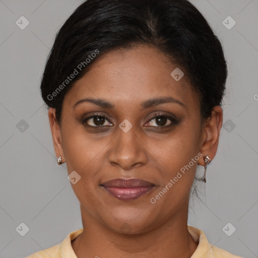 Joyful latino young-adult female with short  brown hair and brown eyes