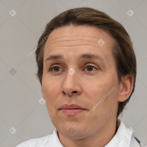 Joyful white adult female with short  brown hair and brown eyes