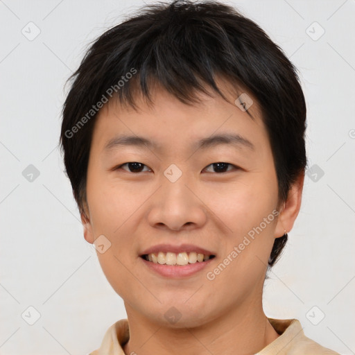 Joyful asian young-adult female with short  brown hair and brown eyes