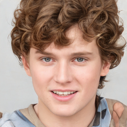 Joyful white young-adult male with medium  brown hair and blue eyes