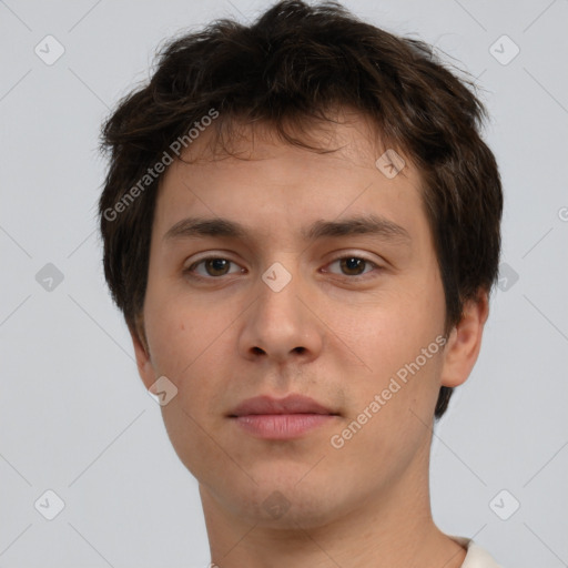 Neutral white young-adult male with short  brown hair and brown eyes