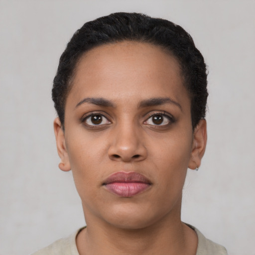Neutral latino young-adult female with short  black hair and brown eyes