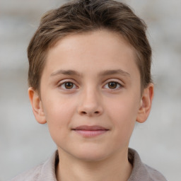 Joyful white child male with short  brown hair and brown eyes