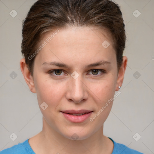 Joyful white young-adult female with short  brown hair and grey eyes