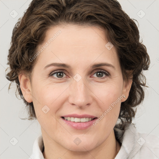 Joyful white young-adult female with medium  brown hair and green eyes