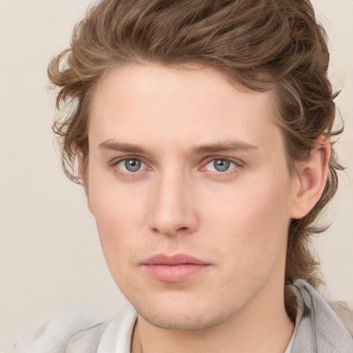 Neutral white young-adult male with medium  brown hair and blue eyes