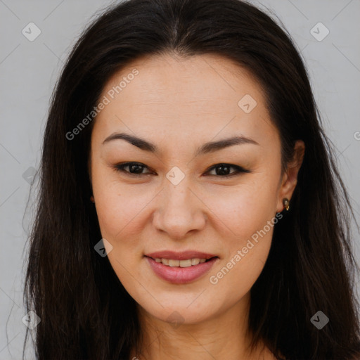 Joyful asian young-adult female with long  brown hair and brown eyes