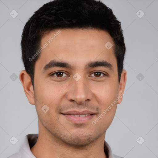 Joyful white young-adult male with short  black hair and brown eyes