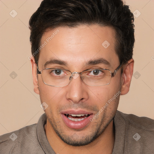 Joyful white adult male with short  brown hair and brown eyes