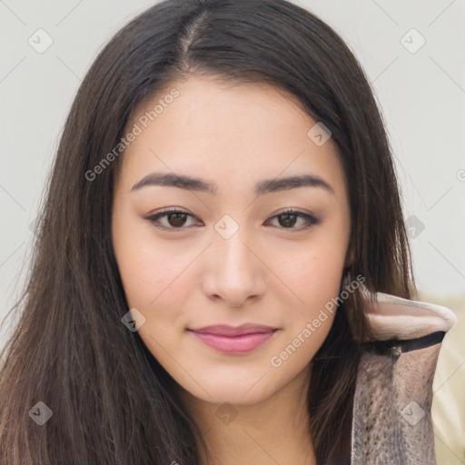 Joyful asian young-adult female with long  brown hair and brown eyes