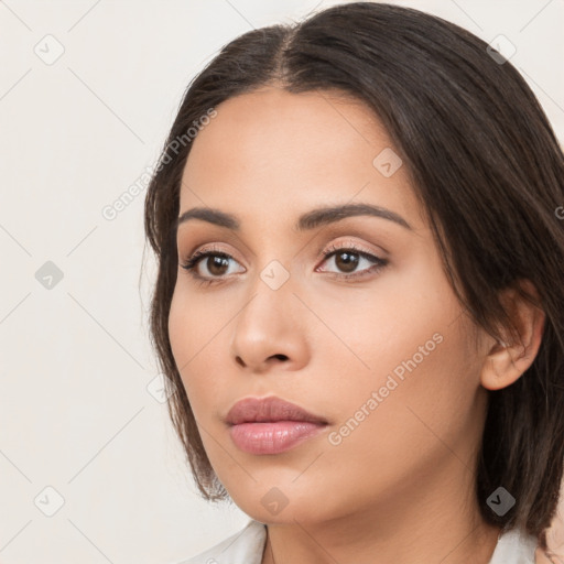 Neutral white young-adult female with medium  brown hair and brown eyes