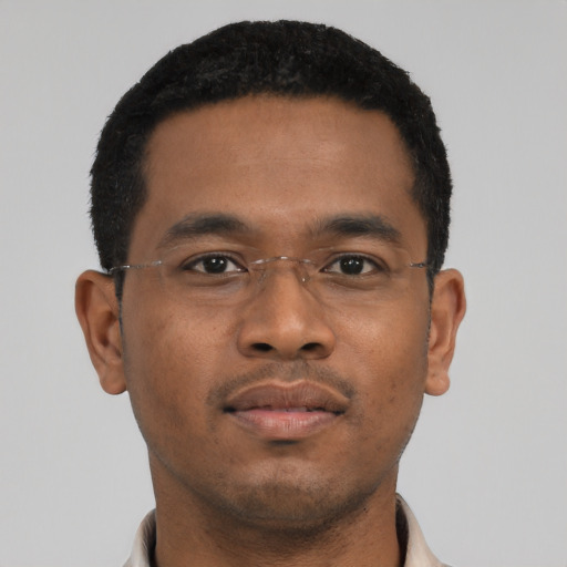 Neutral black young-adult male with short  black hair and brown eyes