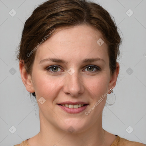 Joyful white young-adult female with medium  brown hair and blue eyes