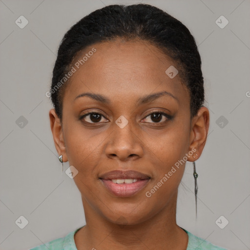 Joyful black young-adult female with short  black hair and brown eyes