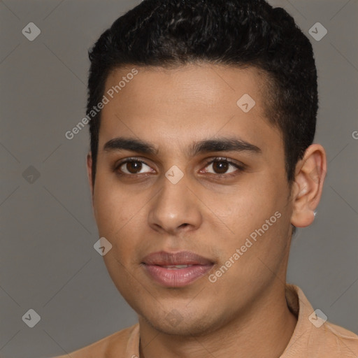 Joyful latino young-adult male with short  brown hair and brown eyes