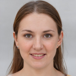 Joyful white young-adult female with medium  brown hair and grey eyes