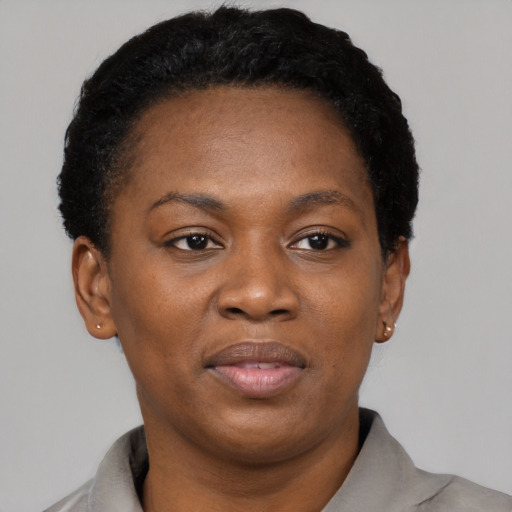 Neutral black young-adult female with short  black hair and brown eyes
