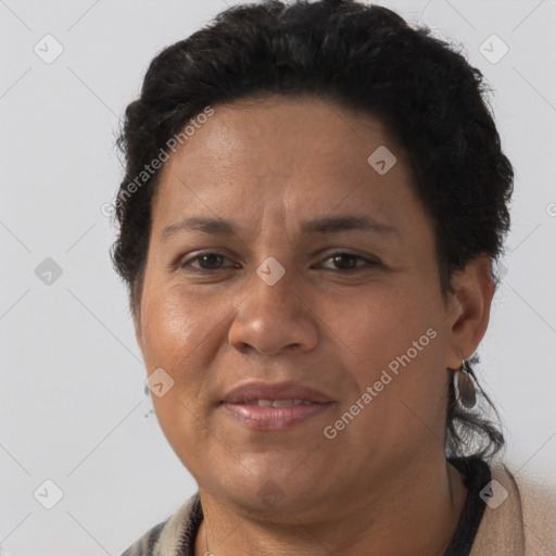 Joyful latino young-adult female with short  brown hair and brown eyes