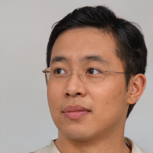 Neutral asian young-adult male with short  brown hair and brown eyes
