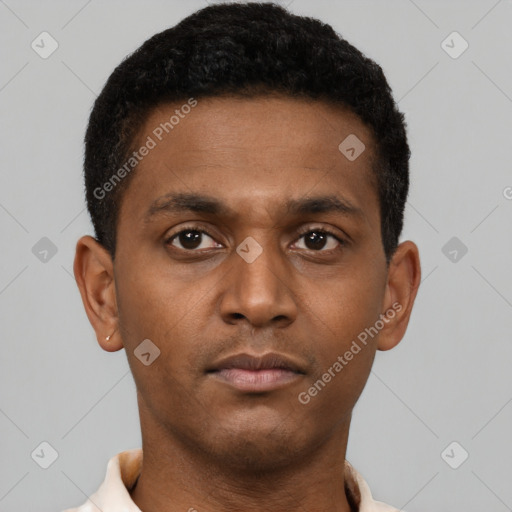 Neutral latino young-adult male with short  brown hair and brown eyes