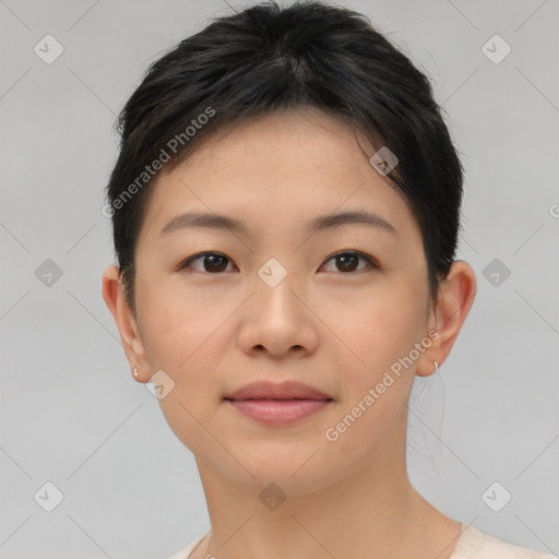 Joyful asian young-adult female with short  brown hair and brown eyes