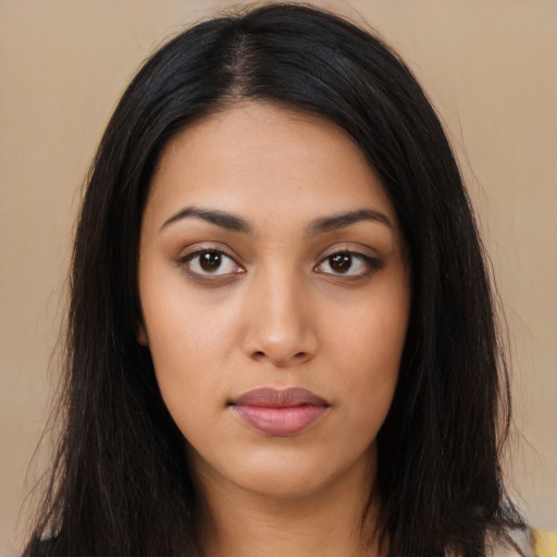 Neutral latino young-adult female with long  black hair and brown eyes