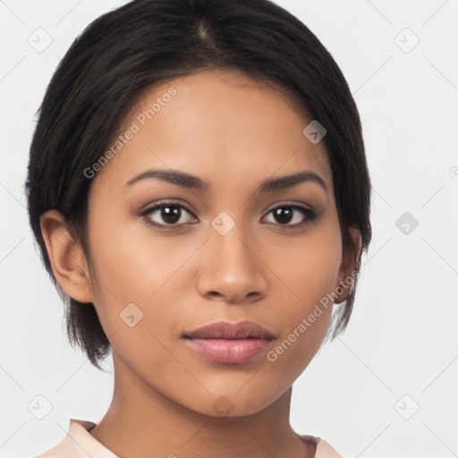 Joyful latino young-adult female with medium  brown hair and brown eyes