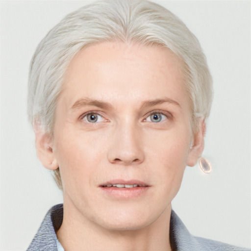 Neutral white adult male with short  blond hair and blue eyes