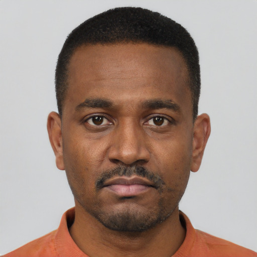 Neutral black young-adult male with short  black hair and brown eyes