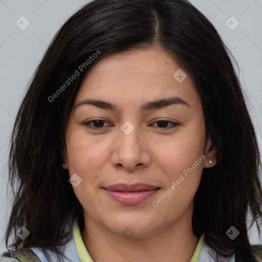 Joyful asian young-adult female with long  brown hair and brown eyes