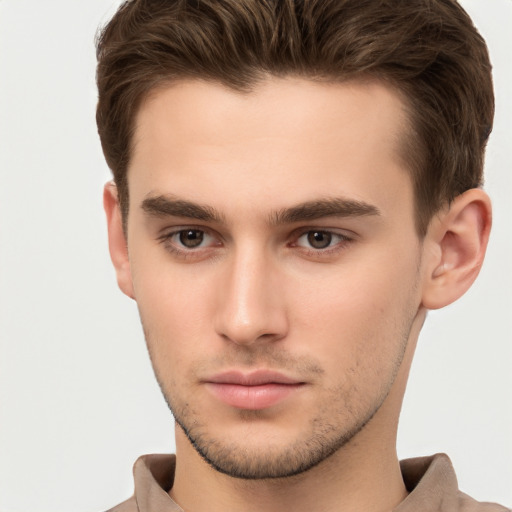 Neutral white young-adult male with short  brown hair and brown eyes