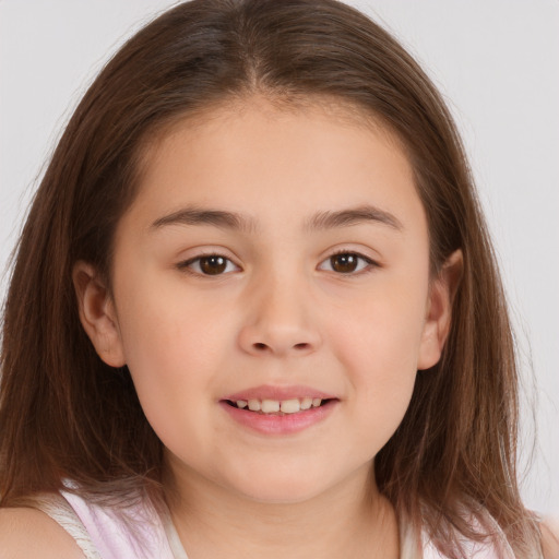 Joyful white child female with medium  brown hair and brown eyes