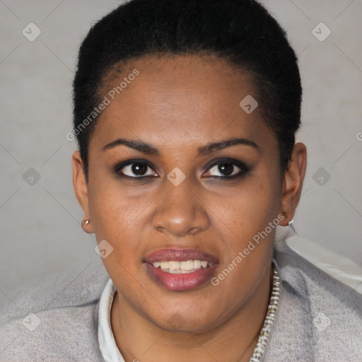 Joyful black young-adult female with short  black hair and brown eyes