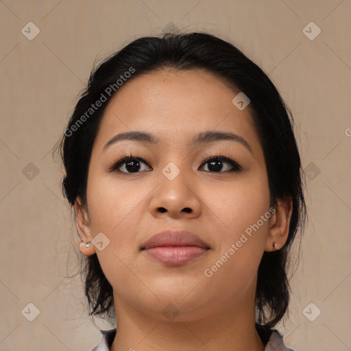 Joyful asian young-adult female with medium  black hair and brown eyes