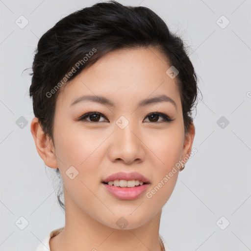 Joyful asian young-adult female with short  brown hair and brown eyes