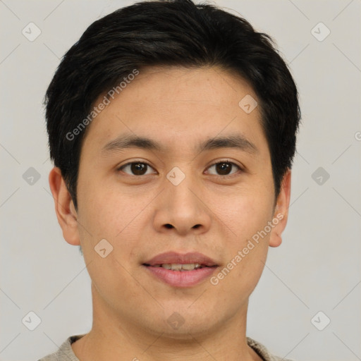 Joyful asian young-adult male with short  brown hair and brown eyes