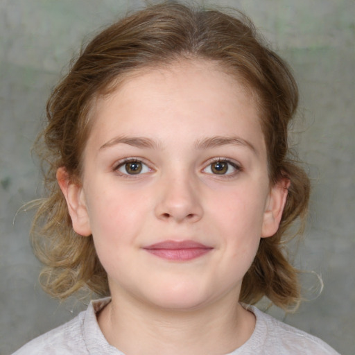 Joyful white child female with medium  brown hair and grey eyes