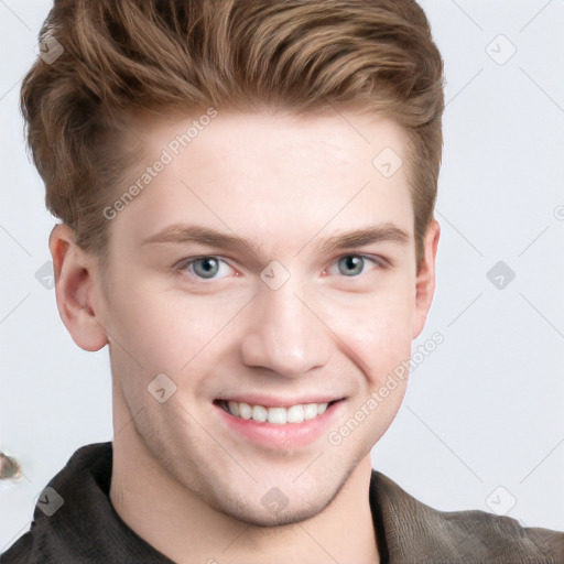 Joyful white young-adult male with short  brown hair and blue eyes