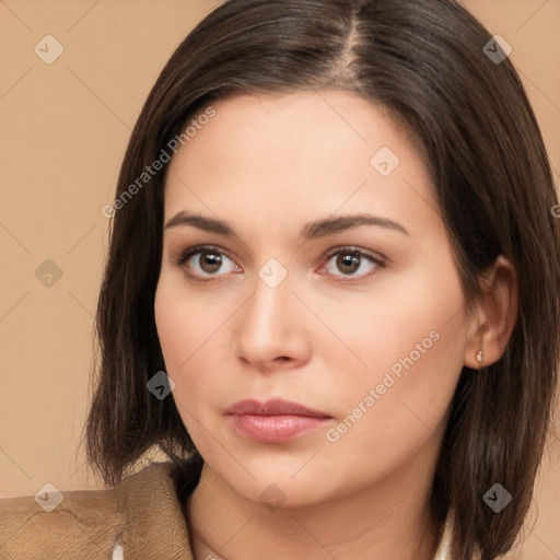 Neutral white young-adult female with long  brown hair and brown eyes