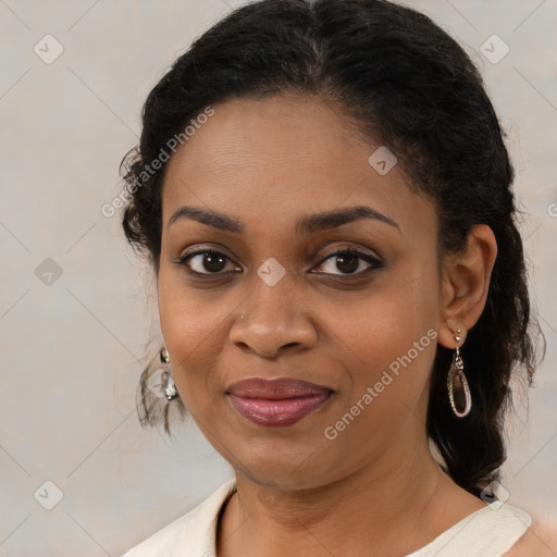 Joyful black young-adult female with medium  brown hair and brown eyes