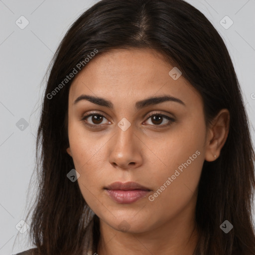 Neutral latino young-adult female with long  brown hair and brown eyes