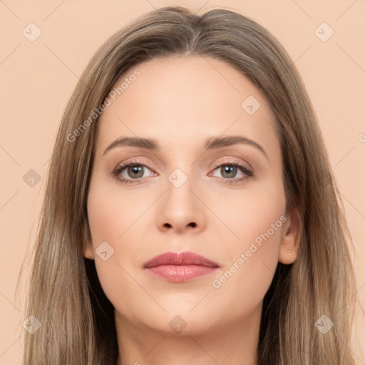 Neutral white young-adult female with long  brown hair and brown eyes