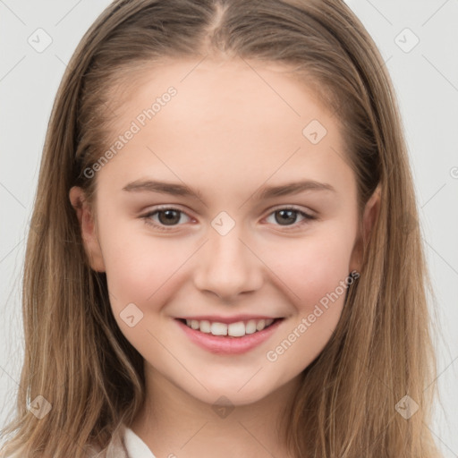 Joyful white child female with long  brown hair and brown eyes