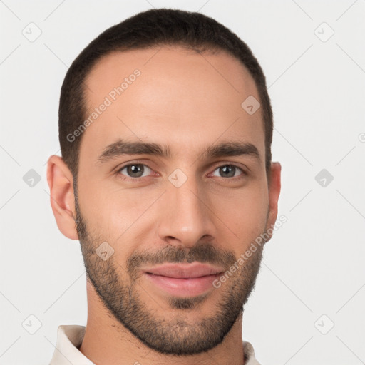 Joyful white young-adult male with short  brown hair and brown eyes