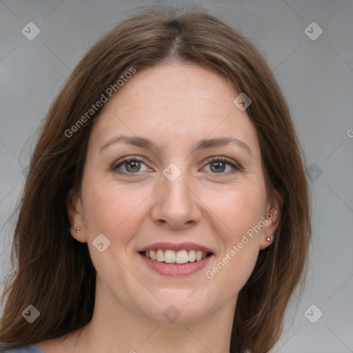 Joyful white adult female with medium  brown hair and grey eyes