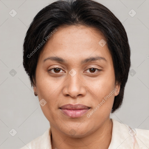 Joyful asian adult female with short  brown hair and brown eyes