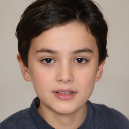 Joyful white child female with short  brown hair and brown eyes