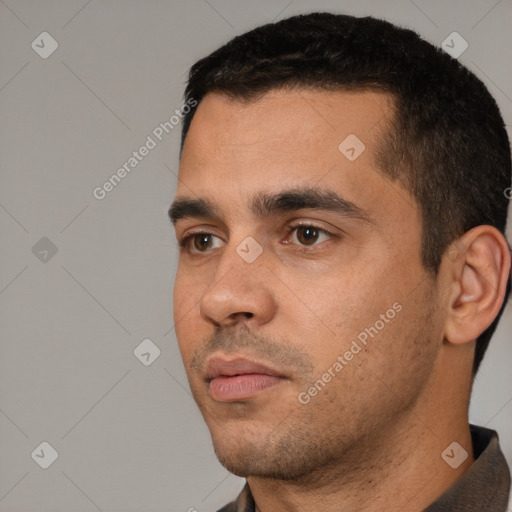 Neutral white young-adult male with short  black hair and brown eyes