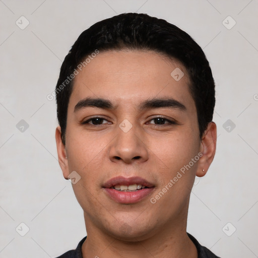 Joyful white young-adult male with short  black hair and brown eyes